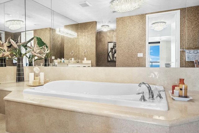 bathroom with a relaxing tiled tub