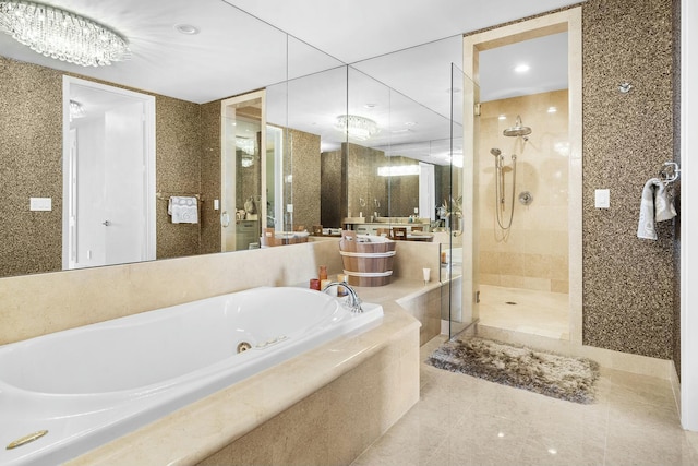 bathroom with tile patterned flooring and plus walk in shower