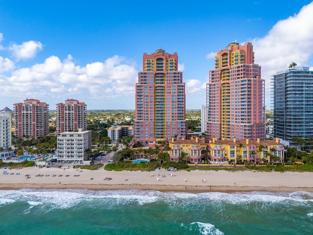 exterior space featuring a view of the beach and a water view