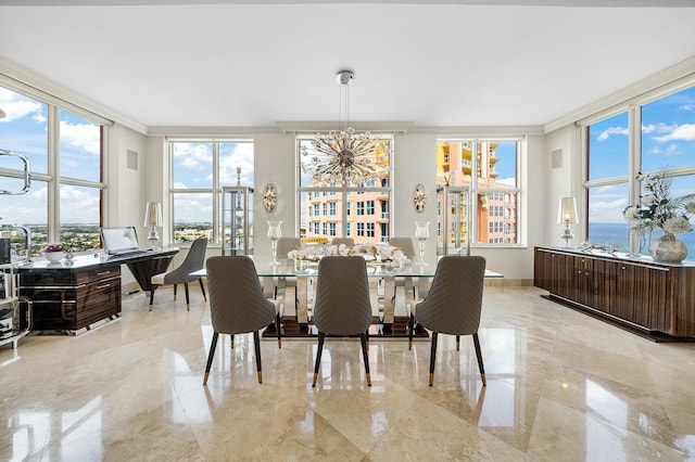 dining space with expansive windows, ornamental molding, and a water view