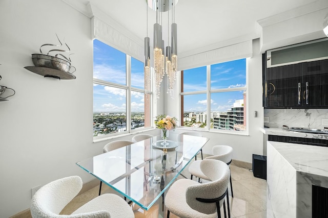 dining space with a chandelier