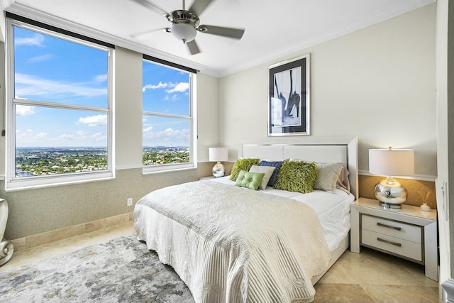 bedroom with crown molding and ceiling fan