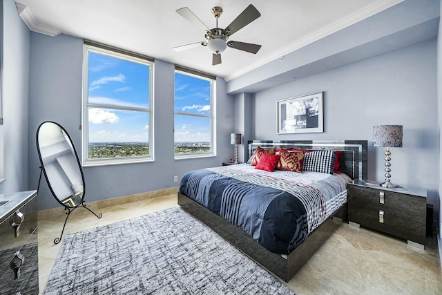 bedroom featuring ceiling fan and ornamental molding