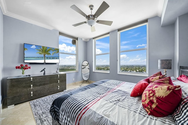 bedroom with ornamental molding and ceiling fan