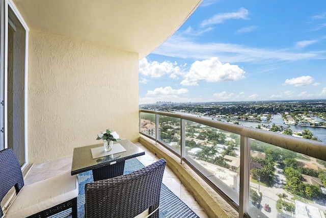 balcony featuring a water view