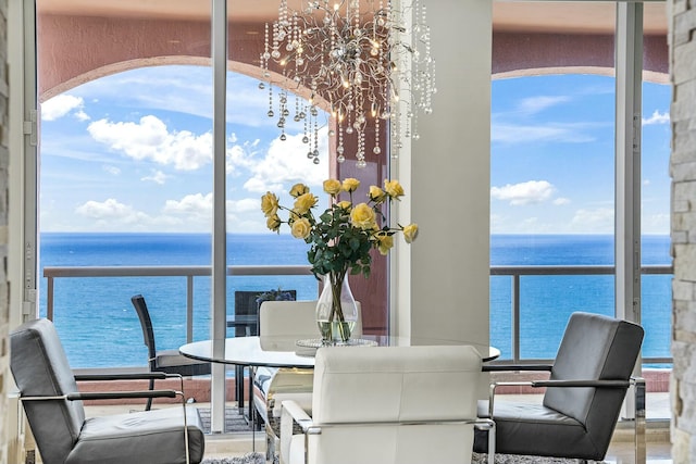 dining space with a water view