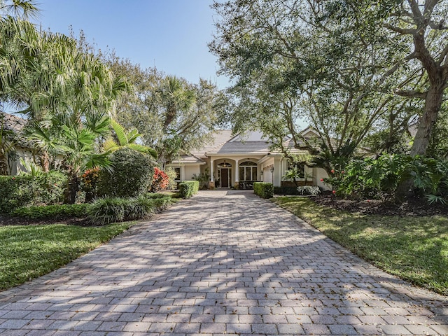 view of front of home with a front lawn