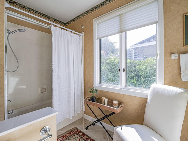 bathroom featuring tile patterned flooring