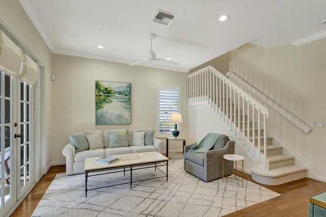 106 Via Santa Cruz, Jupiter, FL 33458 - living room with stairway, wood finished floors, ornamental molding, baseboards, and recessed lighting