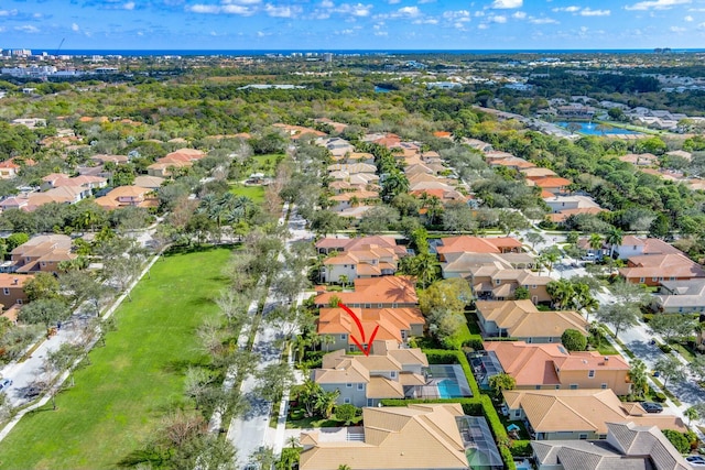 bird's eye view with a water view