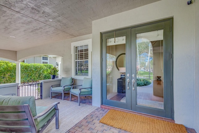 doorway to property featuring french doors