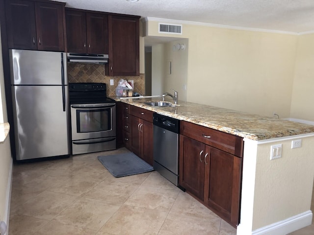 kitchen with sink, appliances with stainless steel finishes, ornamental molding, light stone countertops, and kitchen peninsula