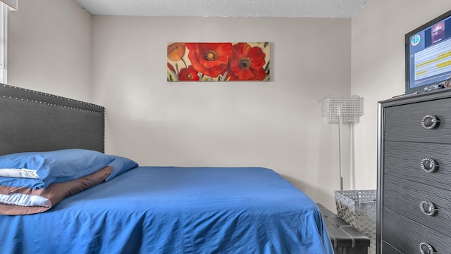 bedroom with a textured ceiling