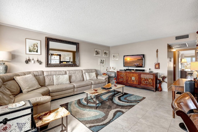 tiled living room with a textured ceiling