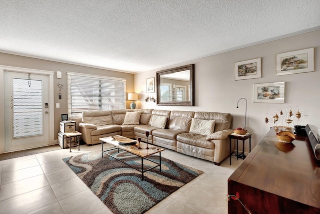 living room with light tile patterned floors and a textured ceiling