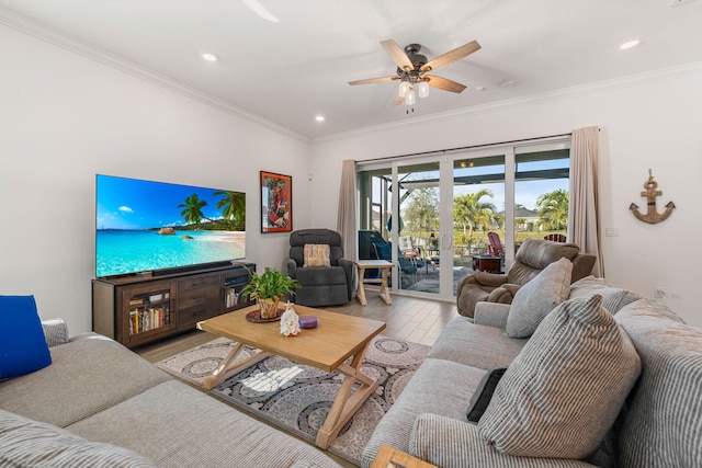 living room featuring french doors, crown molding, ceiling fan, and light hardwood / wood-style flooring