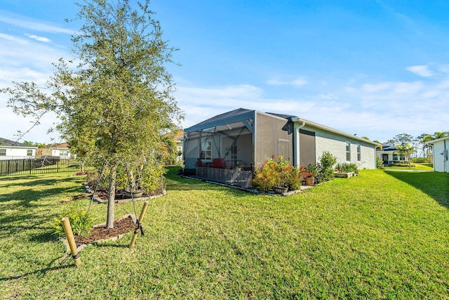 view of yard with a lanai