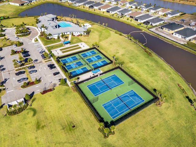 bird's eye view with a water view