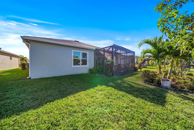 view of yard with a lanai