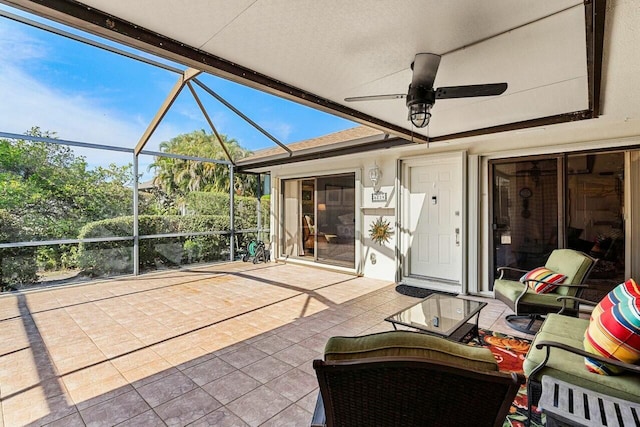 sunroom / solarium with ceiling fan