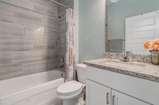 full bathroom with vanity, toilet, and shower / bath combo