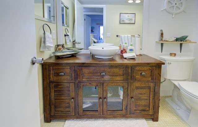 363 Wellington J, West Palm Beach, FL 33417 - bathroom with vanity and toilet