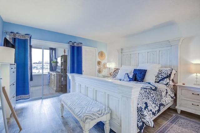363 Wellington J, West Palm Beach, FL 33417 - bedroom with access to exterior and wood-type flooring