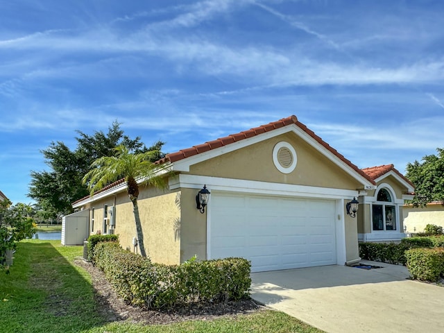 view of home's exterior featuring a garage