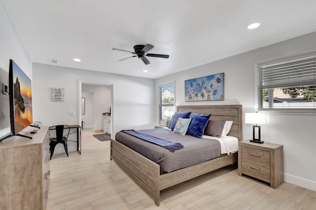 bedroom with ceiling fan and light wood-type flooring