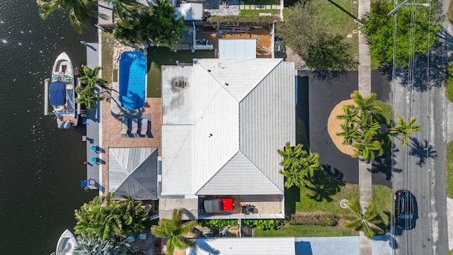 birds eye view of property featuring a water view