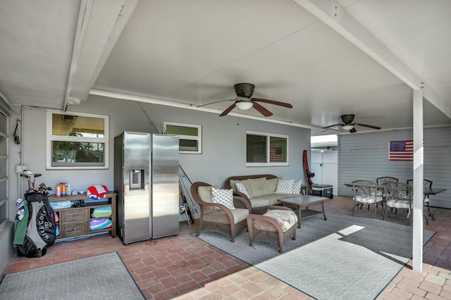 view of patio with an outdoor hangout area and ceiling fan