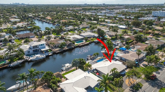 drone / aerial view featuring a water view