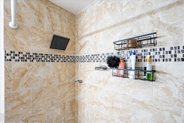 interior space featuring tiled shower