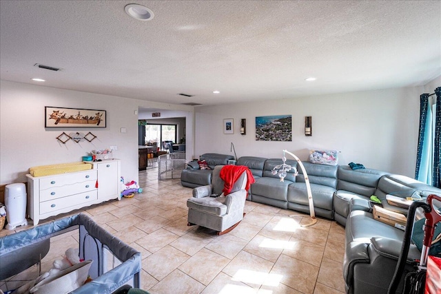 living room featuring a textured ceiling