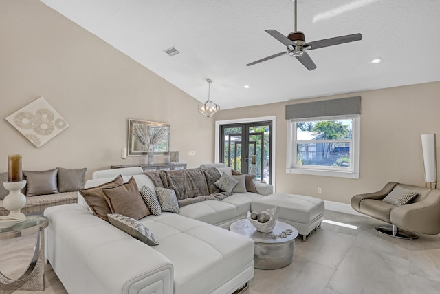 living area with lofted ceiling, recessed lighting, visible vents, baseboards, and french doors