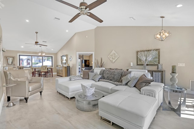 living room with ceiling fan with notable chandelier, high vaulted ceiling, visible vents, and recessed lighting