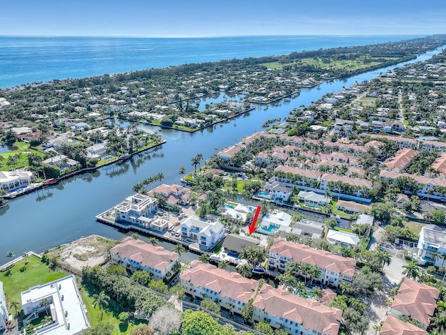 birds eye view of property with a residential view and a water view