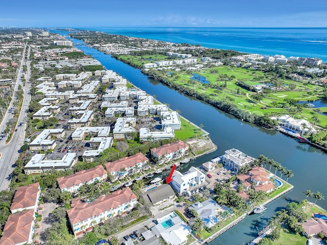 bird's eye view featuring a residential view and a water view