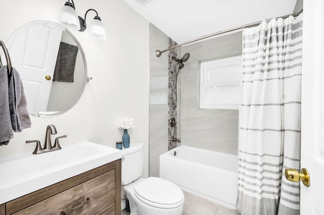 full bathroom with vanity, shower / bath combo, tile patterned floors, and toilet