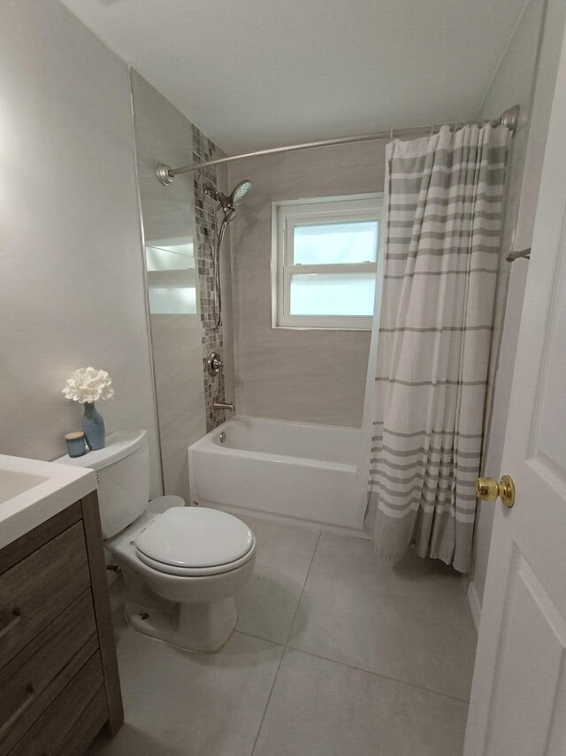 bathroom featuring vanity, tile walls, and a shower with shower curtain