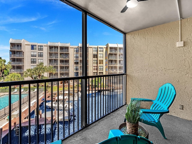 balcony featuring ceiling fan