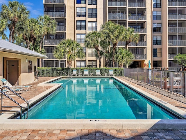 view of swimming pool with a patio