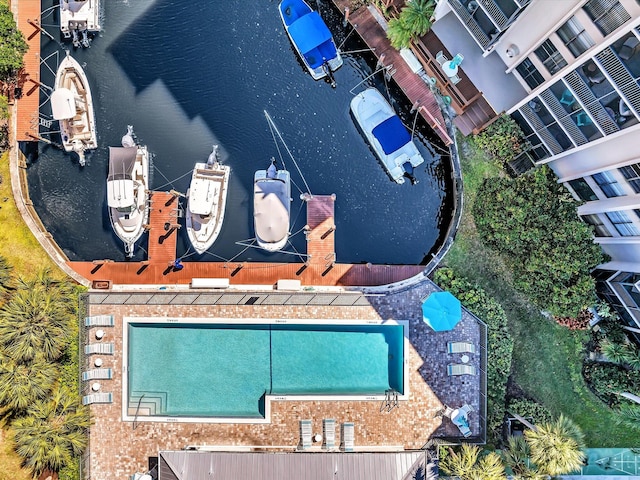 birds eye view of property featuring a water view