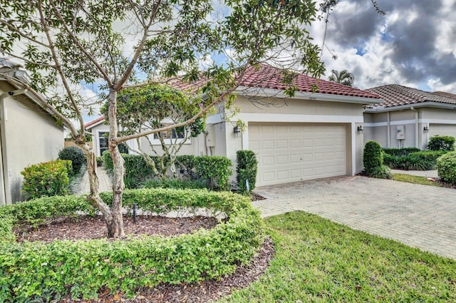 view of front of home with a garage