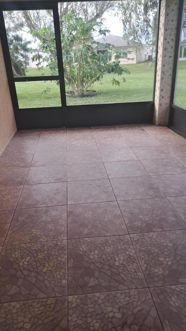 view of unfurnished sunroom