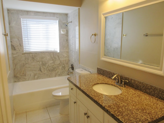 full bathroom with vanity, toilet, tiled shower / bath combo, and tile patterned flooring