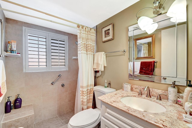 bathroom featuring a shower with curtain, vanity, and toilet