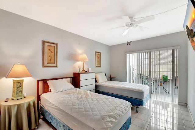 bedroom featuring ceiling fan and light tile patterned floors