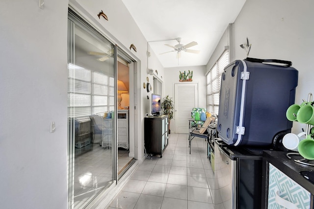 sunroom / solarium featuring ceiling fan and a healthy amount of sunlight