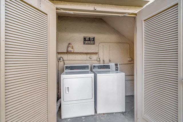 laundry room featuring washer and clothes dryer